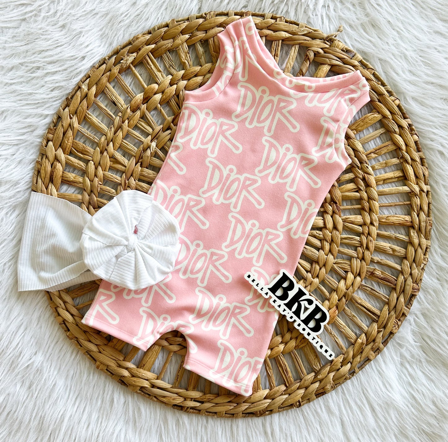 White & baby pinkdior Ollie romper