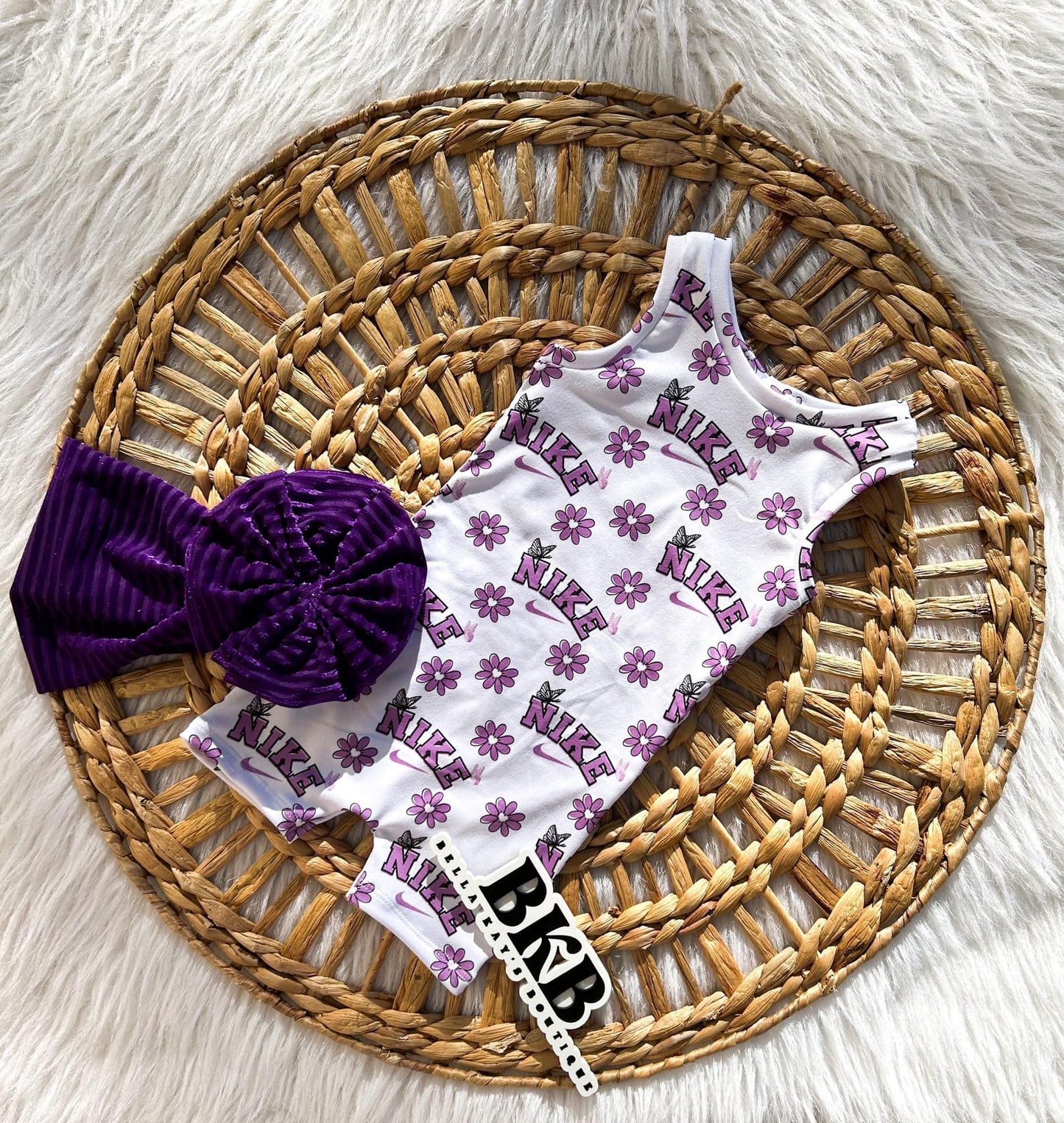 Purple flower&butterfly swoosh Ollie romper