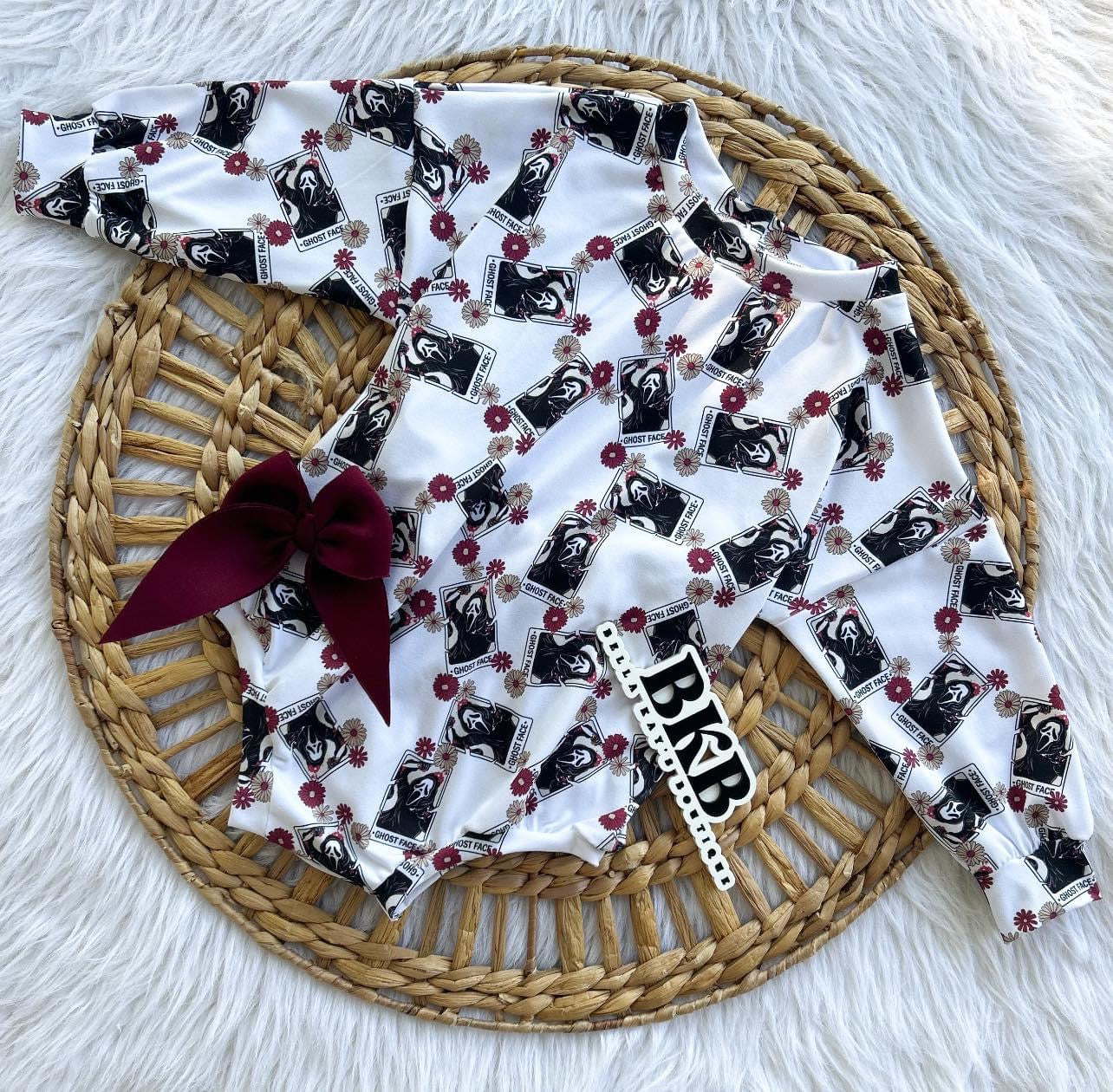 Floral scream long sleeved romper