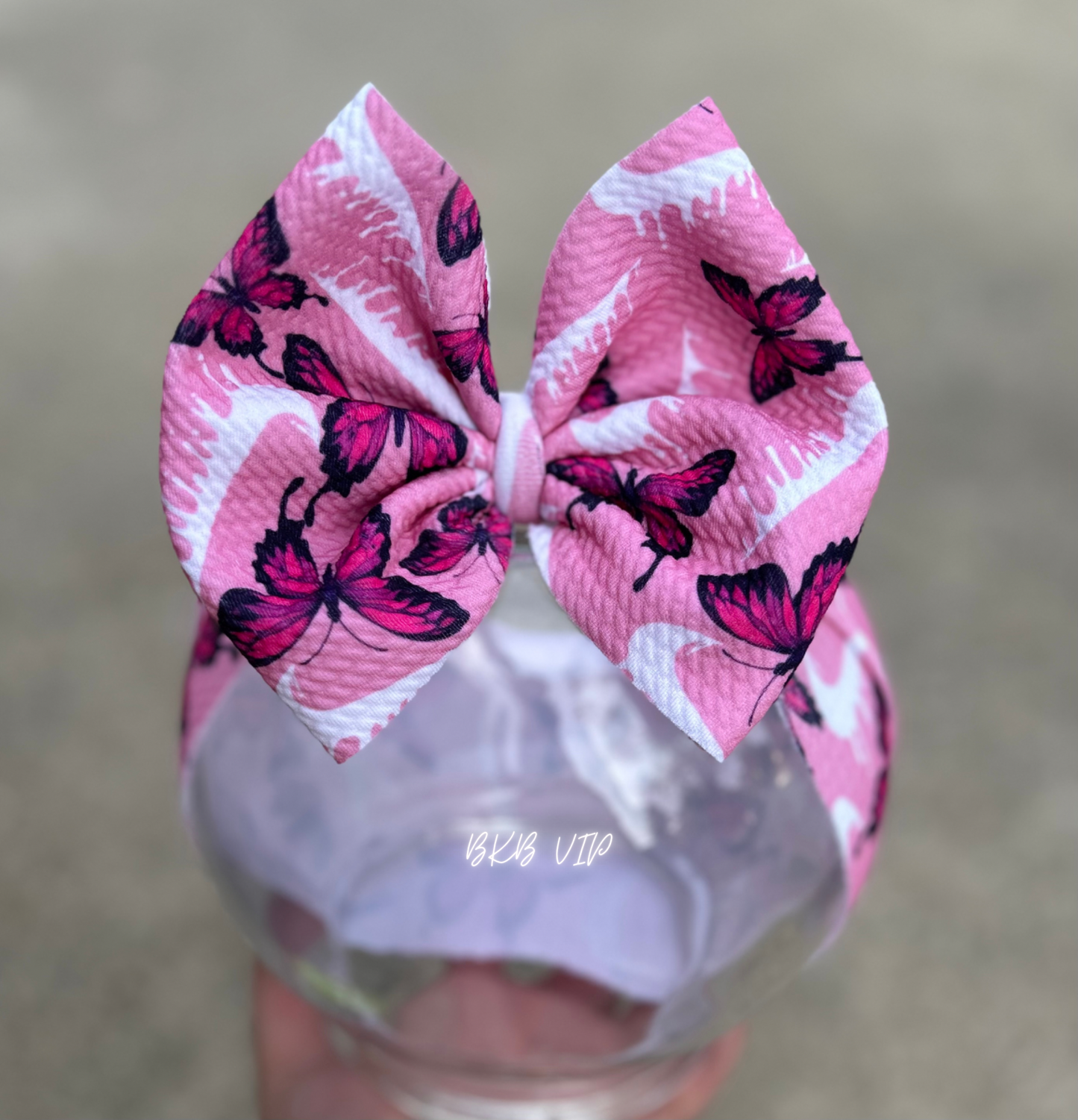 Pink swoosh drip bows