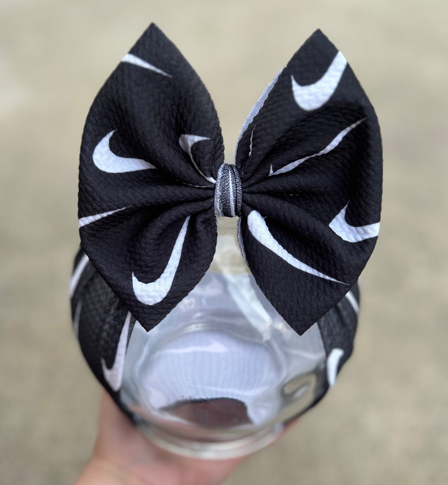 Black swoosh inspired bows