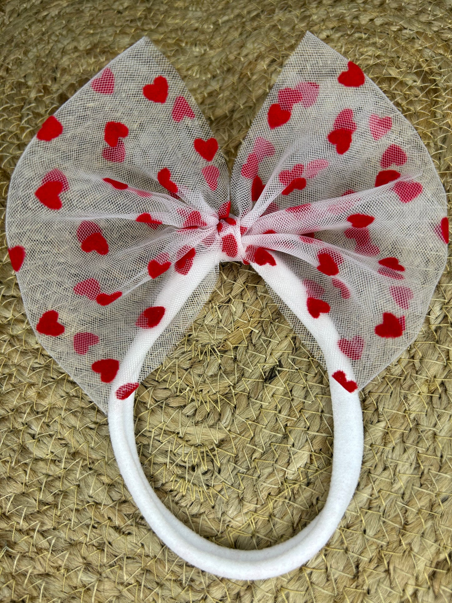 White w red hearts bow with white nylon band