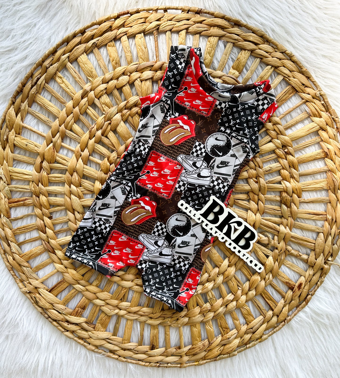 Boy swooshlv patchwork Ollie romper
