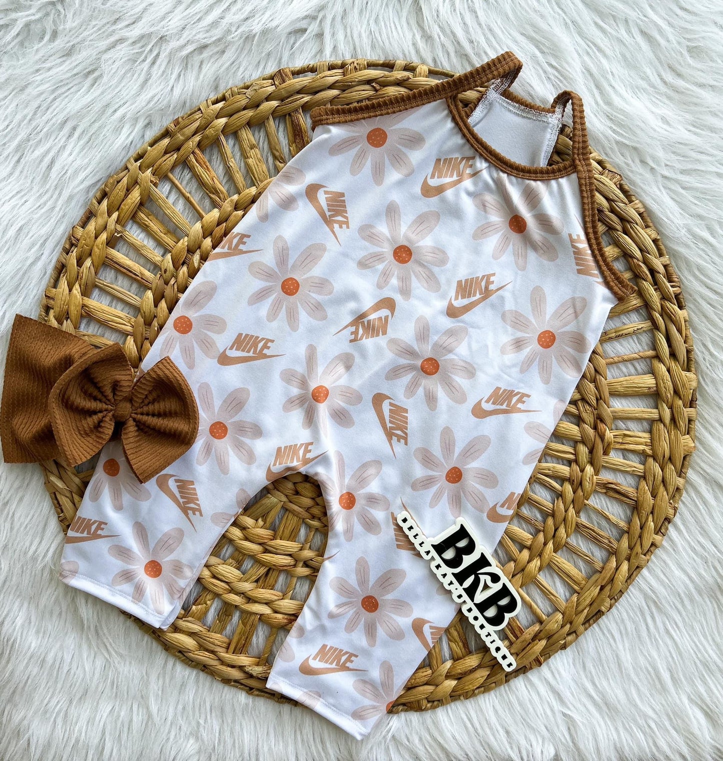 Tan Floralswoosh Terran romper