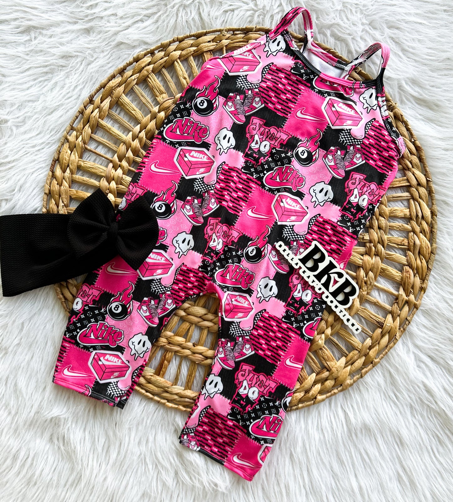 Pink & black swoosh shoe box Terran romper